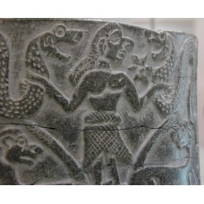 Chlorite vessel with mythological scenes, sun symbol